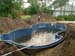 Pool under construction with kids