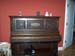 Restored piano in sitting room